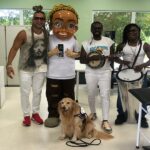 Cão terapeuta e música levam clima de Natal aos pacientes do Hospital Ortopédico do Estado da Bahia